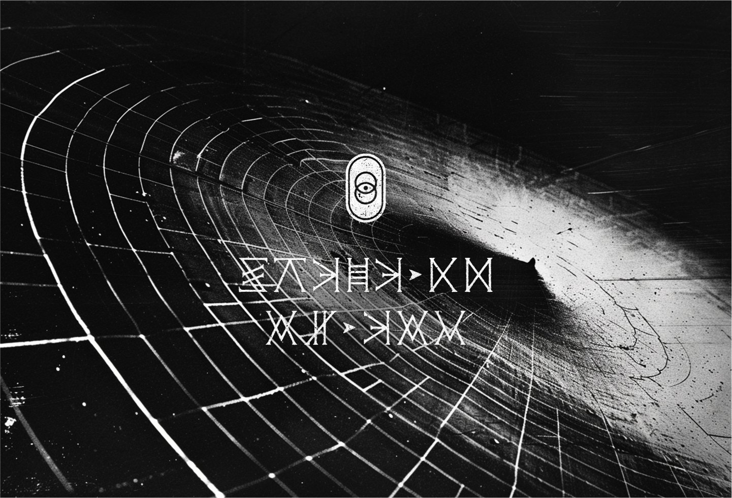 Black and white photo with film grain depicting a glimmering, symmetrical spiderweb, overlaid with a white graphic glyph and message in coded alphabet.